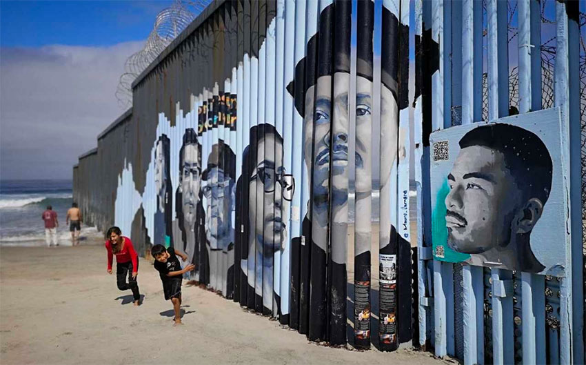 Deported migrants featured in new interactive border wall art in Tijuana